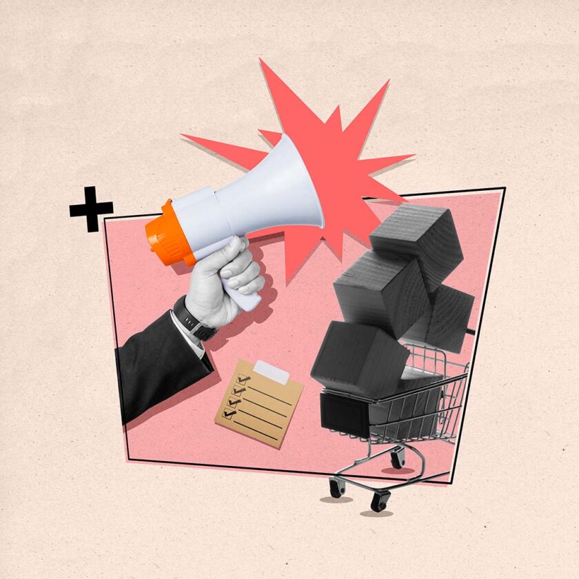 man-holding-megaphone-with-shopping-cart-background